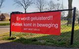 Een spandoek in Nieuwleusen over de actuele situatie rond de N377.