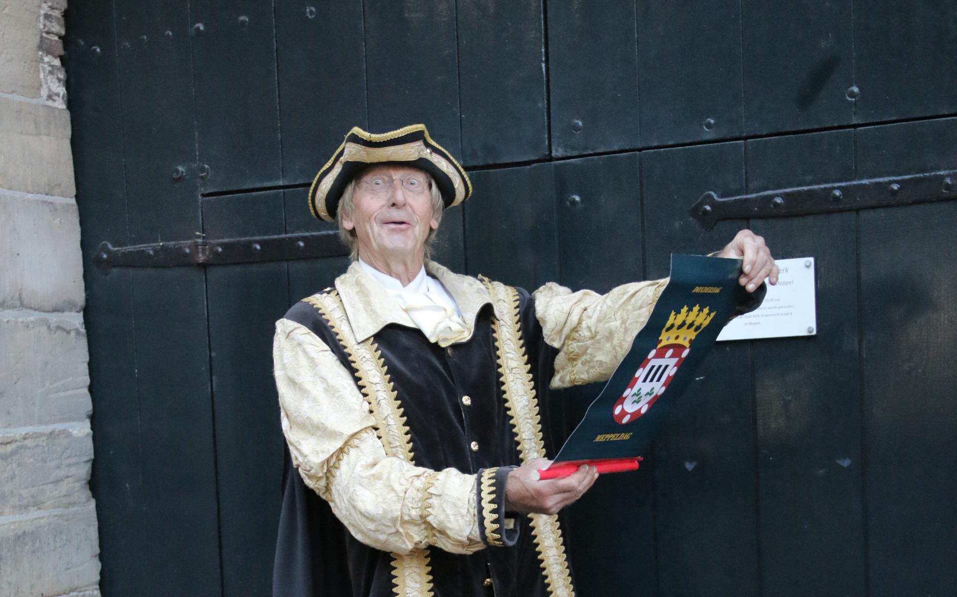 Stadsomroeper Jan Vos.